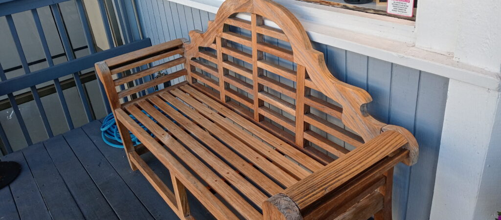 Marlboro bench on the front porch of a local restaurant for 2+ years